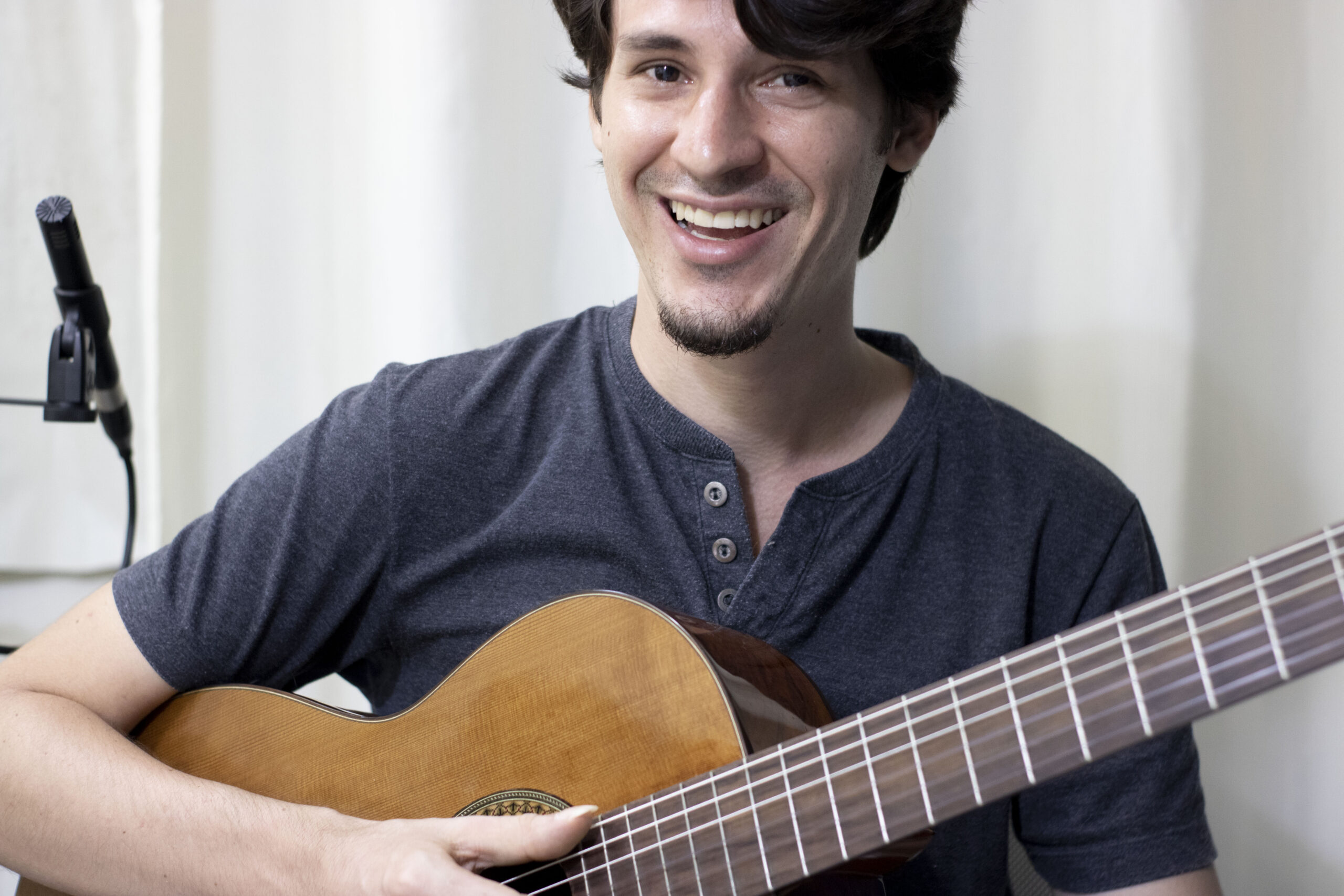 Tom Carvalho playing guitar